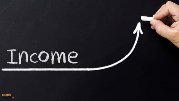Will a universal basic income work in the AI economy?