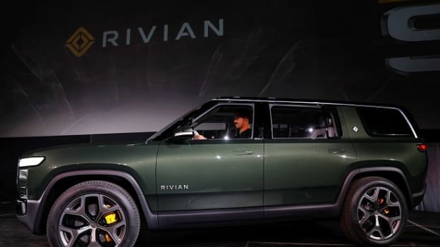Seven US state pension funds buy stakes in EV startup Rivian