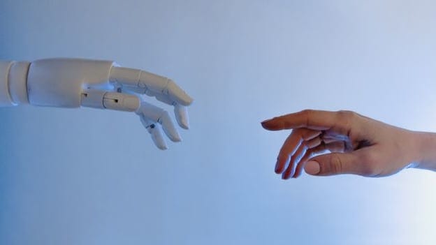 What is looming when AI is booming?