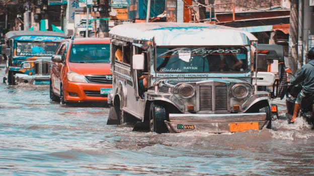 Philippines government advises private employers to suspend work during severe weather