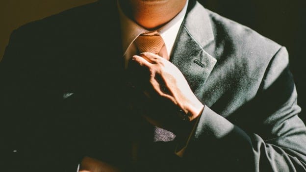 CEO suspended for flaunting wealth while failing to pay workers