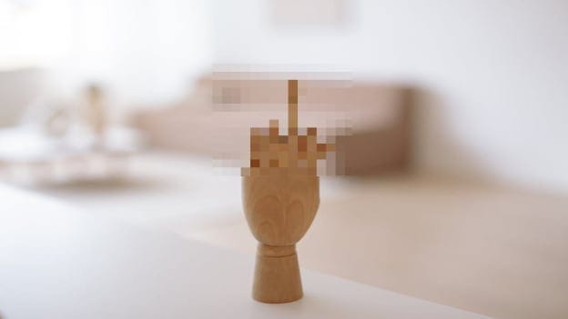 Giving 'the middle finger' at work not sexual harassment, UK court rules