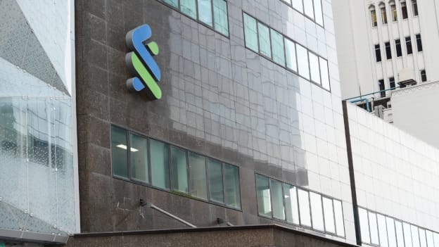 Standard Chartered cuts 80 jobs in Singapore, relocates roles to India