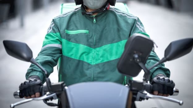 Grab, GoJek drivers push back against merger and pay cuts