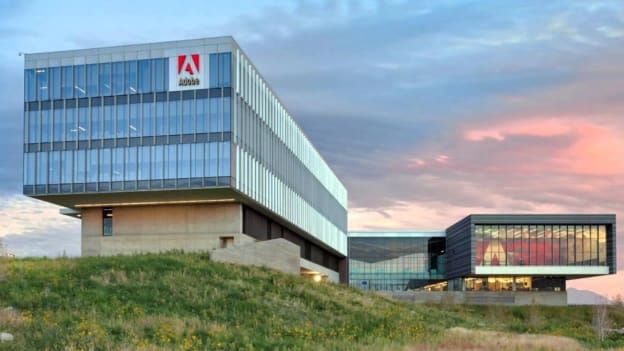 Adobe bucks layoff trend, pledges no company-wide job cuts